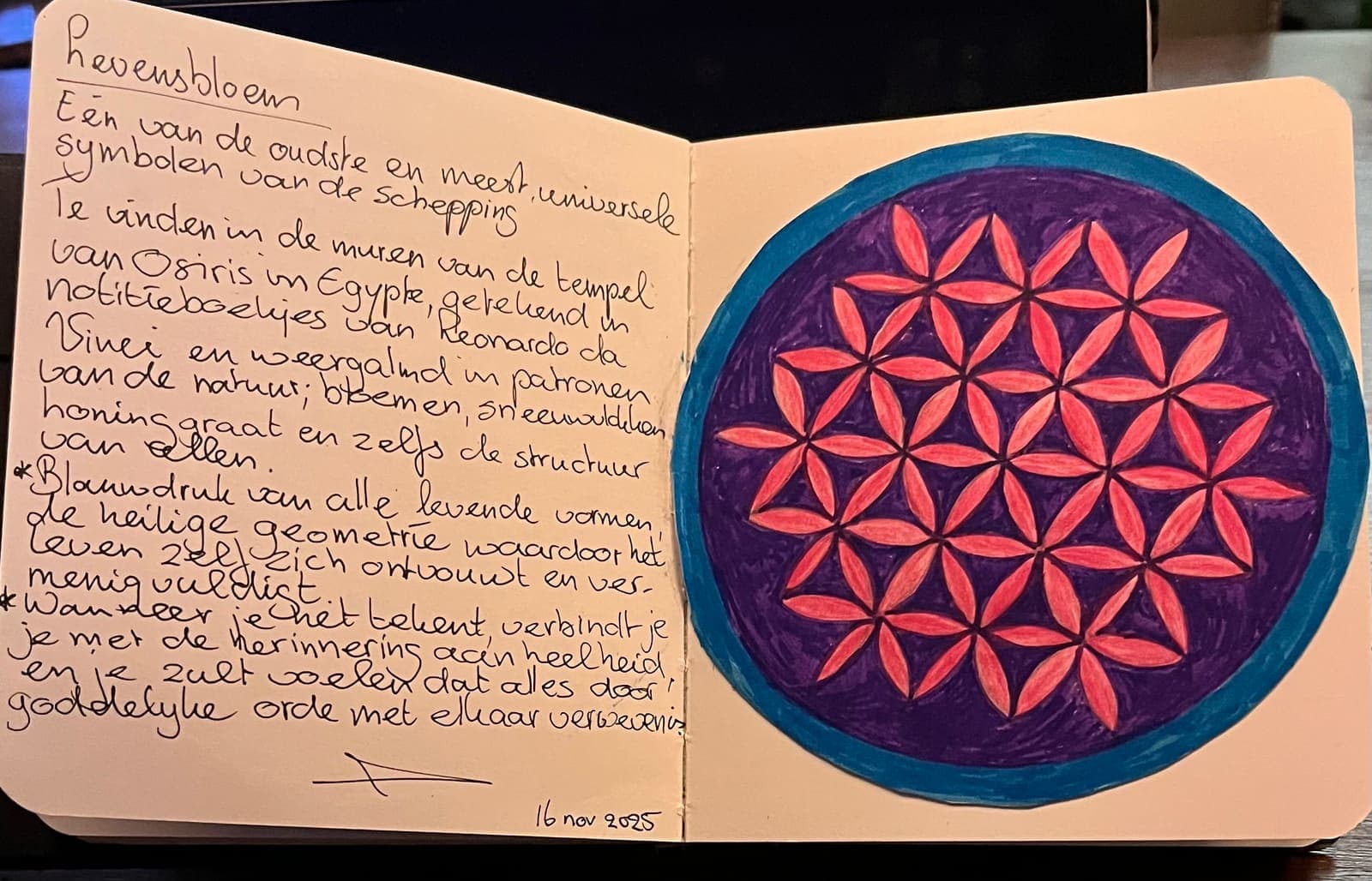 Hand-painted Flower of Life mandala in coral and purple with reflective notes
